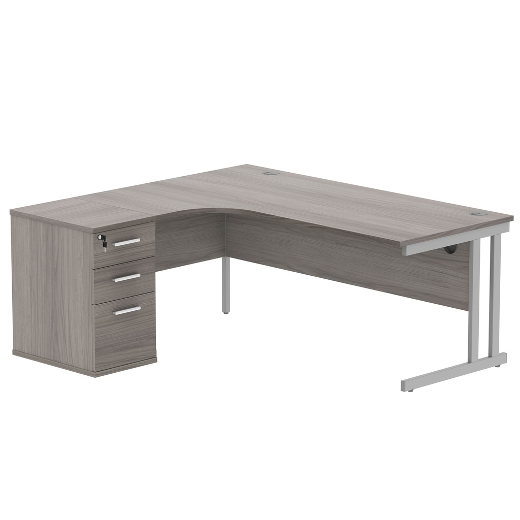 Double Upright Left Hand Radial Desk + Desk High Pedestal (FSC) | 600mm Deep Pedestal | 1800X1200 | Alaskan Grey Oak/Silver
