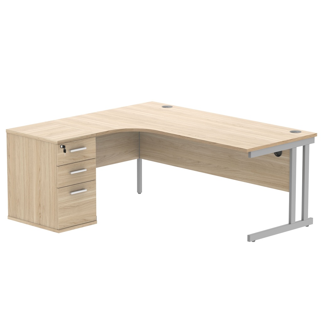 Double Upright Left Hand Radial Desk + Desk High Pedestal (FSC) | 600mm Deep Pedestal | 1800X1200 | Canadian Oak/Silver